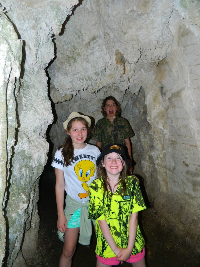 Madison, Kyla and Harrison in a cave.
